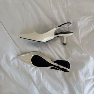 White kitten heels